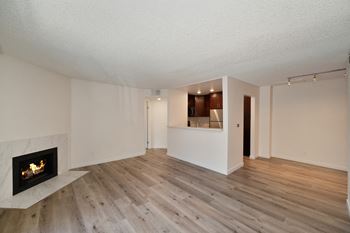 Apartment home with hardwood inspired flooring through out.